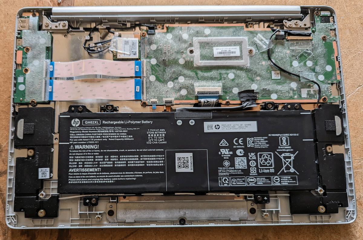 HP Chromebook opened up for a repair inspection