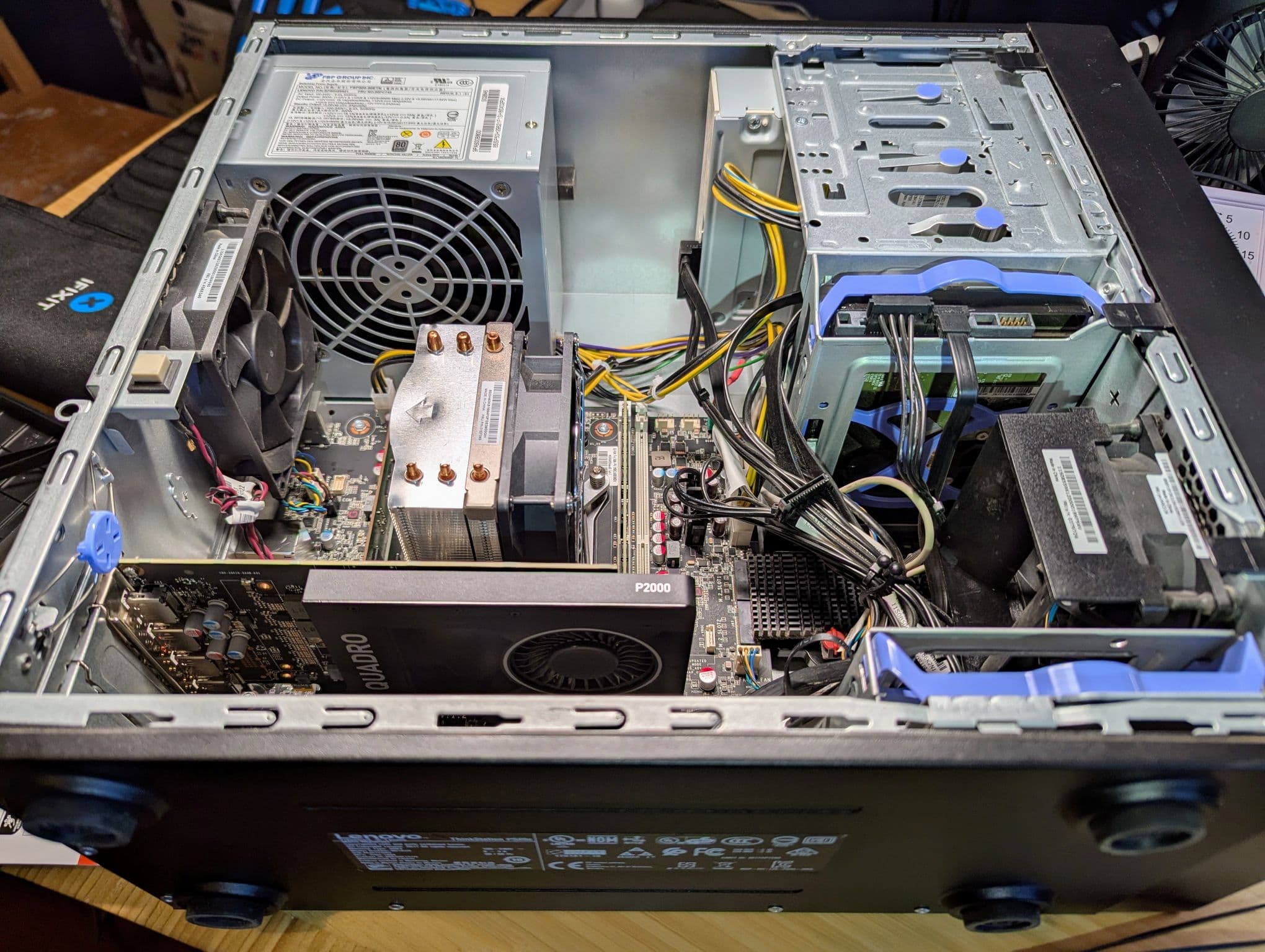 SSD being installed in a Lenovo desktop for faster boot times